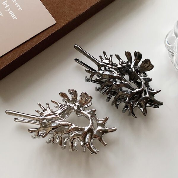 Liquid Metal Conch Claw